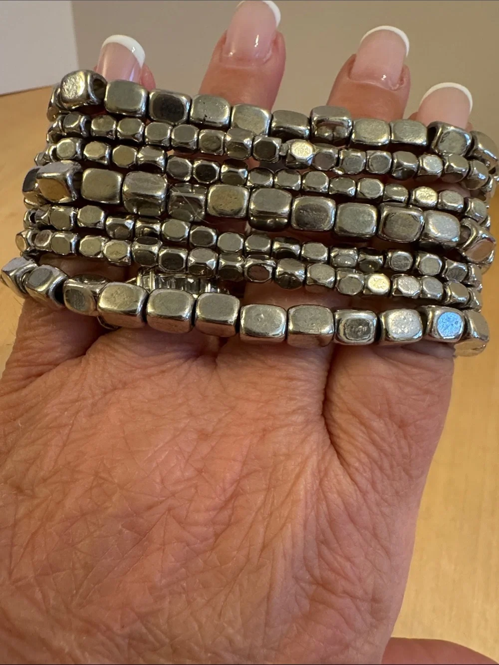 Chunky multi-strand, silver tone burnished nugget set of 7 bracelets